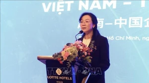Yang Yanyan, Chairwoman of the Guangxi Council for the Promotion of International Trade, speaks at the Viet Nam–China Business Seminar (Photo: VNA)