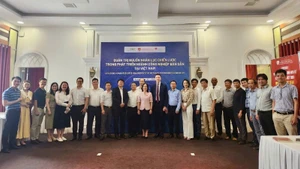 Delegates pose for a group photo at the workshop.