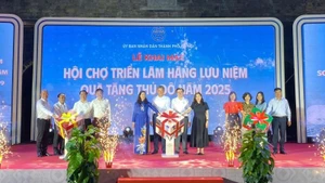 Delegates attend the opening ceremony of the programme.