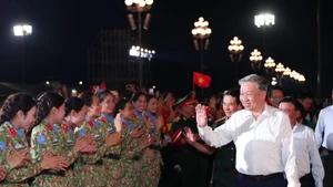 General Secretary To Lam attends the political and artistic programme entitled "Under the Glorious Flag" at the Ba Dinh Square (Ha Noi). (Photo: VNA)