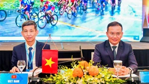 Director of the Department of Physical Training and Sports Nguyen Danh Hoang Viet (left), and Deputy Director Nguyen Hong Minh attend the conference.