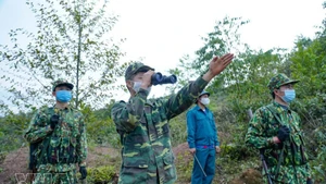 Soldiers of the A Pa Chai Border Guard Station in Dien Bien patrol the border area. (Photo: VNA)