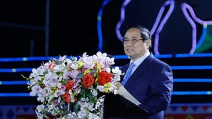 PM Pham Minh Chinh speaks at the opening ceremony of the Ban Flower (Bauhinia) Festival 2026 in Dien Bien province on March 8 evening. (Photo: VGP)
