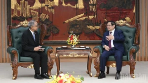 Prime Minister Pham Minh Chinh receives Indonesian Ambassador to Viet Nam Adam Mulawarman Tugio in Ha Noi on March 20. (Photo: VNA)