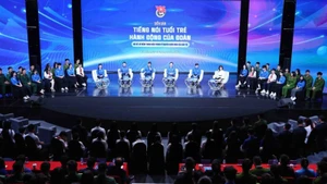 The forum is held in a hybrid format combining in-person and online participation. (Photo: VNA) 