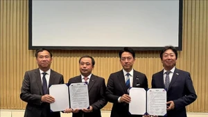 At a MoU exchange ceremony (Photo: VNA)