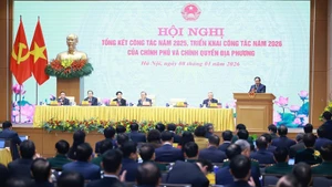 Overview of the January 8 conference reviewing the Government and localities’ 2025 performance and launching 2026 tasks (Photo: VNA)