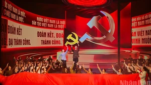 A performance from the political and artistic performance programme titled “Forever Faithful to the Party”. (Photo: BAO LONG)