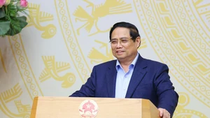 Prime Minister Pham Minh Chinh addresses the 7th meeting of the Government’s Steering Committee for reviewing and untangling knots in the legal document system on January 17 (Photo: VNA)