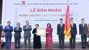 The Viet Nam-France Friendship and Cooperation Association receives the Second Class Labour Order at the ceremony.