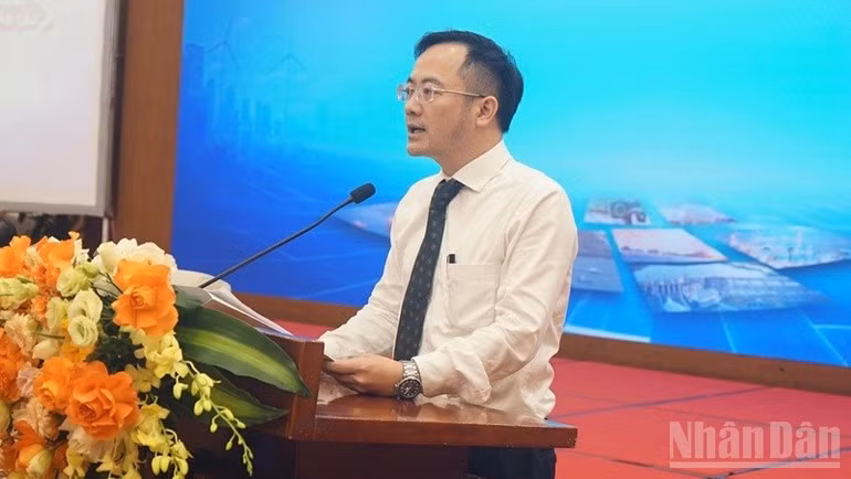 Dr Ha Khac Minh, Editor-in-Chief of the Corporate Finance Magazine, speaking at the event. (Photo: TRUNG HUNG)