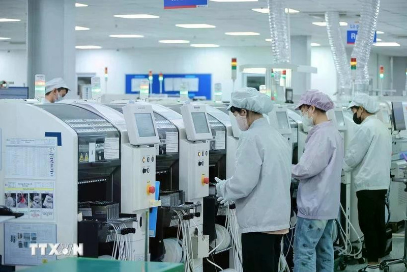 Many FDI enterprises have invested big in advanced and modern machinery systems for production. (Photo: VNA)