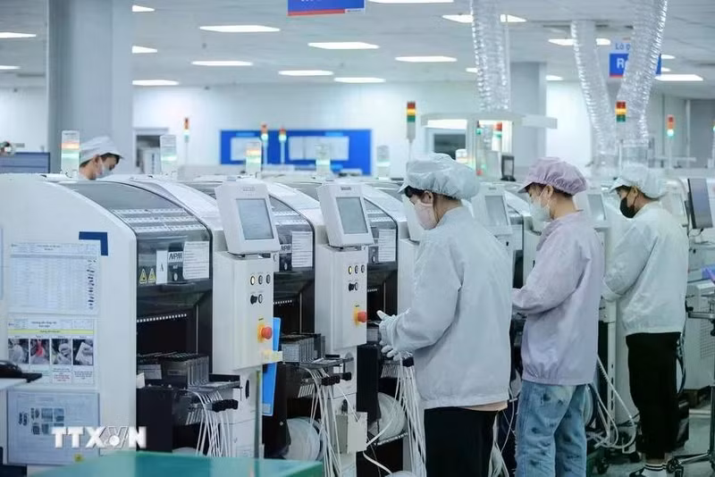 Many FDI enterprises have invested big in advanced and modern machinery systems for production. (Photo: VNA)