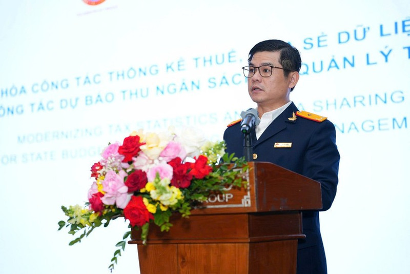 Deputy Director General Vu Chi Hung delivers the opening remarks.