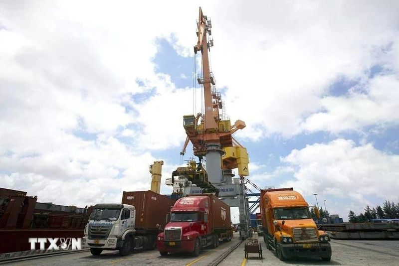Trucks carrying export goods at Tan Vu Port in Hai Phong city (Photo: VNA)