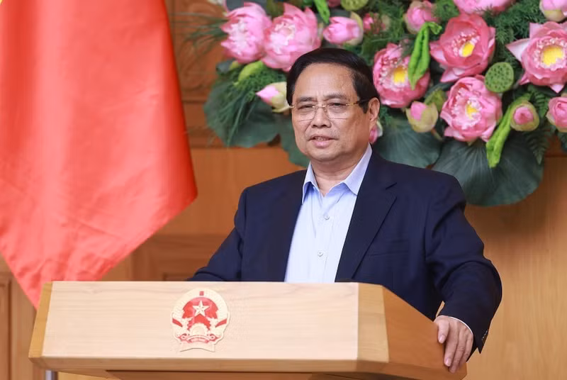 PM Pham Minh Chinh addresses the conference reviewing the one-month operation of the two-tier local government model on July 28. (Photo: VNA)