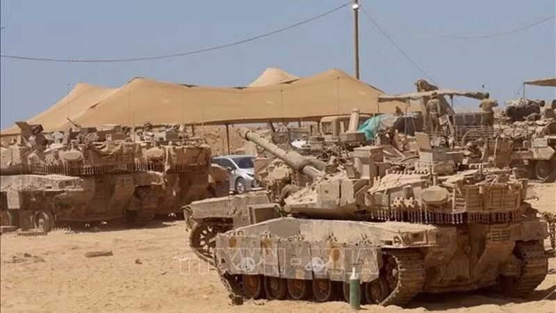 Israeli military vehicles have been deployed near the border with the Gaza Strip. (Photo: Xinhua/VNA)