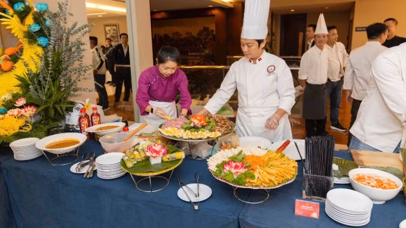 Guests experience cuisine after the press briefing.