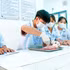 Students at Cuu Long University conduct a laboratory experiment. (Photo: VAN DO)