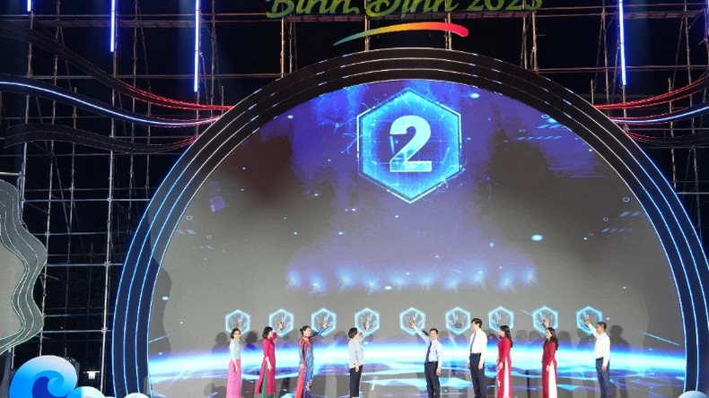 Delegates press the button to open the festival.