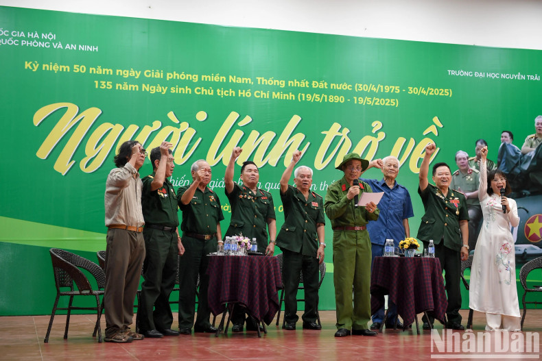 Delegates and nearly 3,000 students loudly chant slogans expressing patriotism. Delegates and nearly 3,000 students loudly chant slogans expressing patriotism.