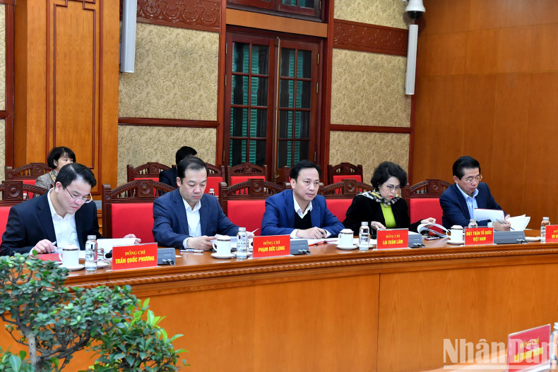 Delegates attend the meeting.