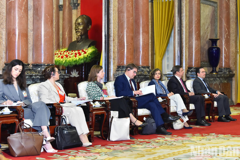 Spanish delegates attend the reception.