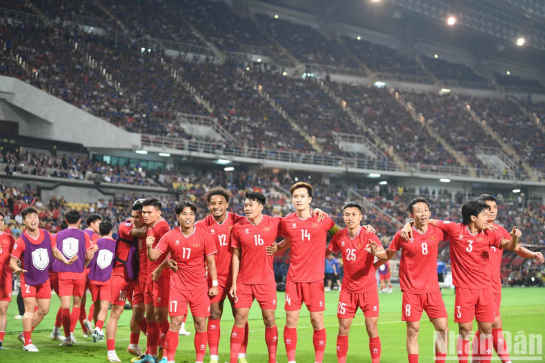 Members of the Vietnamese team celebrate the opening goal. Members of the Vietnamese team celebrate the opening goal.