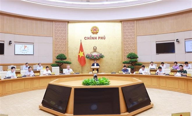 Prime Minister Pham Minh Chinh chairs the Government’s law-building session on May 22 (Photo: VNA) Prime Minister Pham Minh Chinh chairs the Government’s law-building session on May 22 (Photo: VNA)