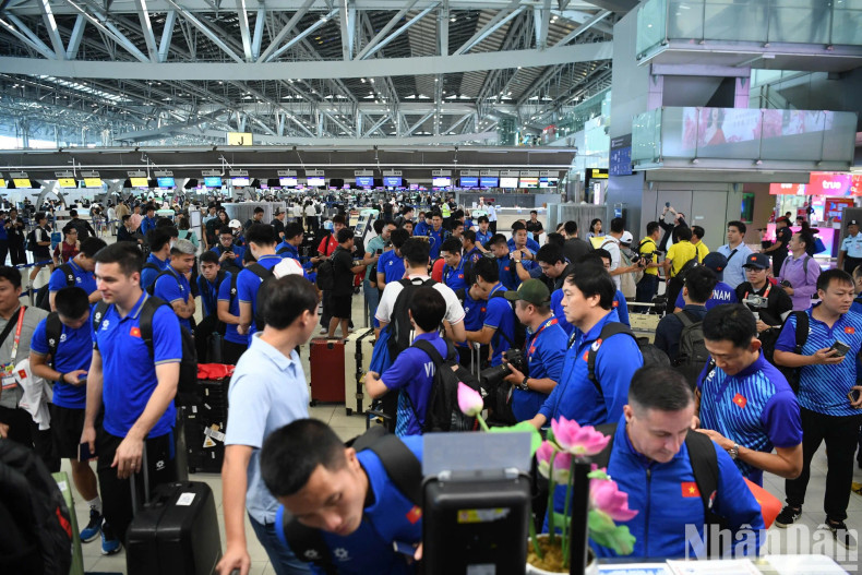 The Vietnamese team checks in.