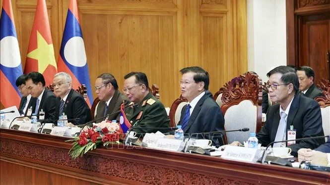 Party General Secretary and President of Laos Thongloun Sisoulith and the Lao high-ranking delegation at the talks with President To Lam and members of the Vietnamese high-ranking delegation. Party General Secretary and President of Laos Thongloun Sisoulith and the Lao high-ranking delegation at the talks with President To Lam and members of the Vietnamese high-ranking delegation.