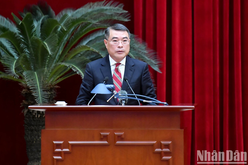 Politburo member, Secretary of the Party Central Committee and Head of the PCC's Organisation Commission Le Minh Hung speaks at the conference.