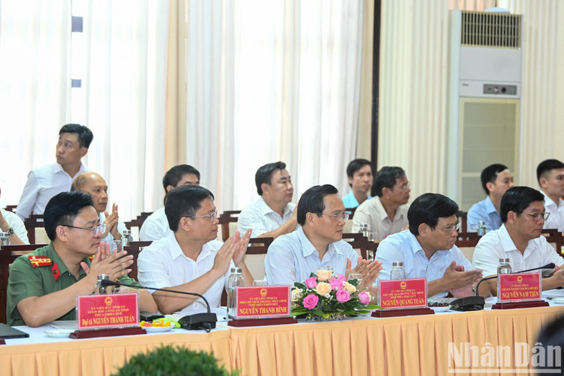 Delegates attend the session.