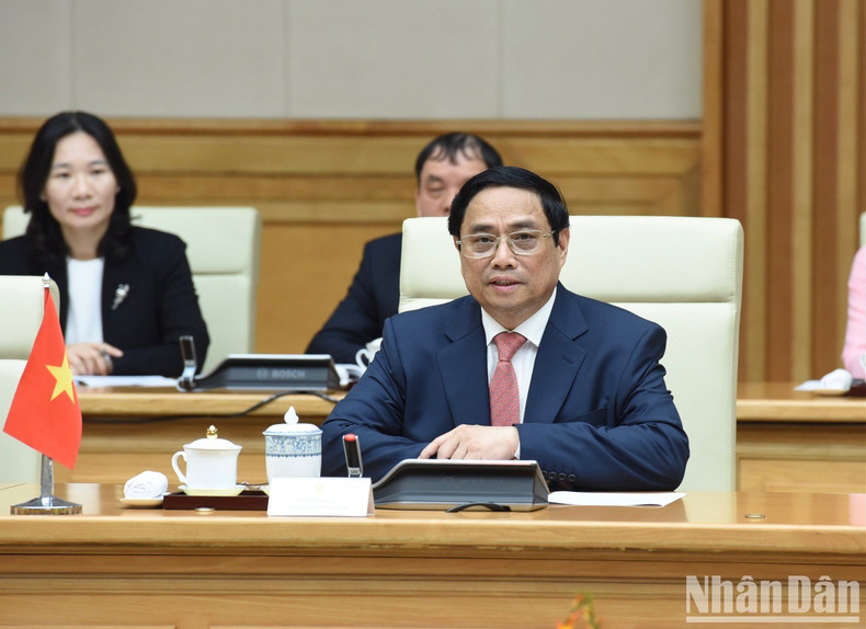 PM Pham Minh Chinh speaks at a meeting with PM Xavier Bettel.