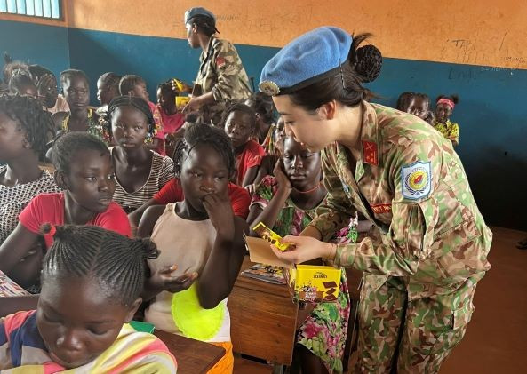 Giving sweets to children on a charity trip. Giving sweets to children on a charity trip.