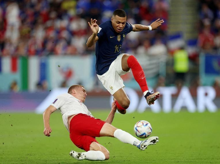 Denmark’s Rasmus Kristensen in action with France’s Kylian Mbappe. (Photo: Reuters)
