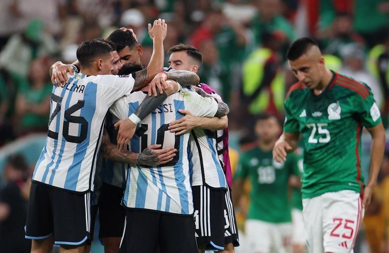 Argentina’s Lionel Messi celebrates with his teammates after the match against Mexico. (Photo: Reuters)