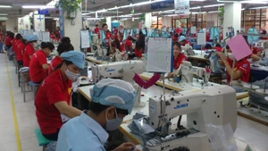 Production of export garments at Garment 10 Corporation.