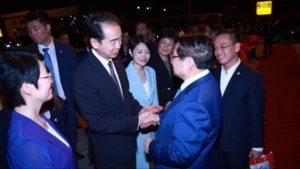 Farewell ceremony for Prime Minister Pham Minh Chinh on the conclusion of his trip to attend the 16th WEF in Tianjin and pay the official working visit to China. (Photo: Duong Giang/VNA)