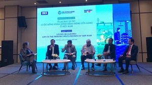 Delegates in discussion at the conference.