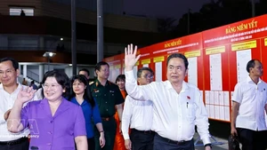 National Assembly Chairman Tran Thanh Man (first row, right) at the 2026 army enlistment camp of Dong Thanh commune in Ho Chi Minh City on March 3 evening. (Photo: VNA)