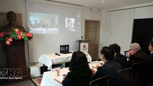 Delegates attend the seminar on new developments in US tariff policy organised by Permanent Mission of Viet Nam in Geneva. (Photo: VNA)