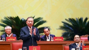 The 14th National Congress of the Communist Party of Viet Nam (CPV) continues a full-day session on January 22, chaired by Party General Secretary To Lam – President of the Presidium. (Photo: VNA)
