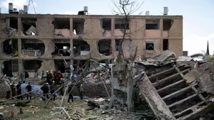 A building destroyed by a missile strike in Dimona, Israel, on March 22, 2026. (Photo: Xinhua/VNA)