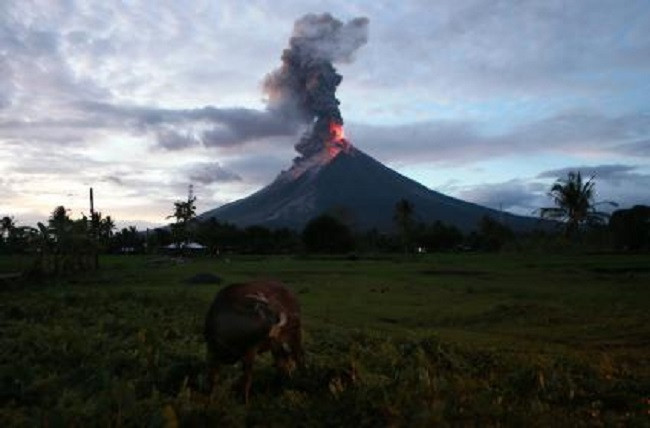 Philippines raises alert level at rumbling volcano after rockfall, quakes