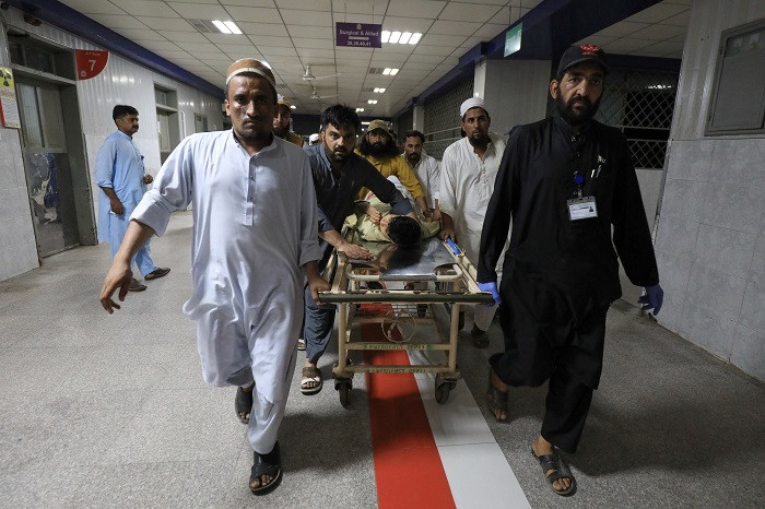 The death toll from the suicide attack at a political gathering in the Bajaur district of Pakistan's northwest Khyber Pakhtunkhwa province on Sunday jumped to 54 after more injured succumbed to their injuries, a police official said on Monday.