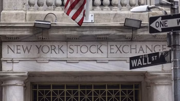 U.S. stocks steady, dollar softens as weak data supports Fed pause