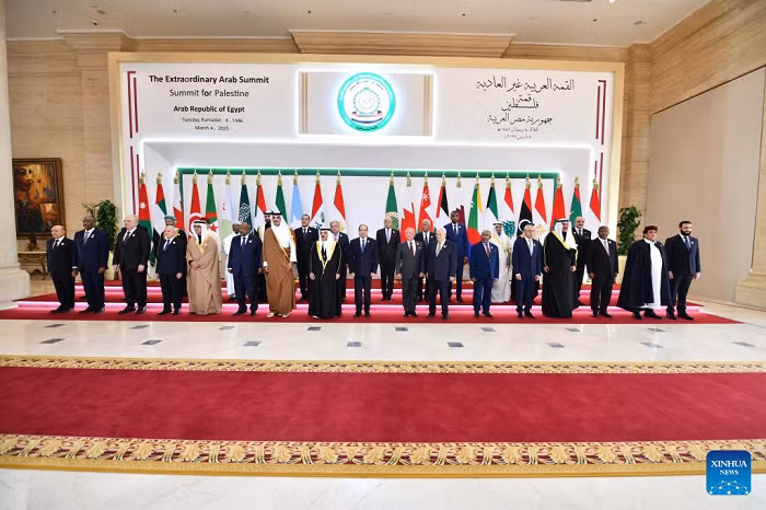 Participants pose for a group photo before attending the Extraordinary Arab Summit-Summit for Palestine in New Administrative Capital, Egypt, on March 4, 2025. An emergency Arab summit kicked off in Egypt's New Administrative Capital on Tuesday, gathering Arab leaders and delegations as well as representatives from international organizations to discuss the latest developments in Palestine and the reconstruction of Gaza. (Source: Egyptian Presidency/Handout via Xinhua). 
