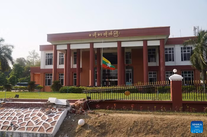 A national flag of Myanmar flies at half-mast at the headquarters of Myanmar Post in Nay Pyi Taw, Myanmar, March 31, 2025. Myanmar's State Administration Council Chairman Senior General Min Aung Hlaing on Monday announced a week-long mourning period following a 7.9-magnitude earthquake that struck Myanmar on March 28. (Photo: Xinhua) 