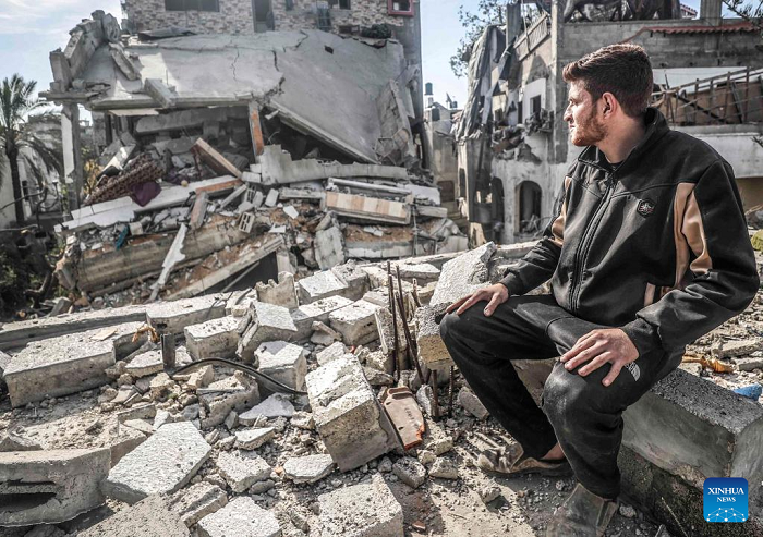 A Palestinian man sits on the rubble of a destroyed house after an Israeli airstrike in Jabalia refugee camp, northern Gaza Strip, on April 16, 2025. At least 19 Palestinians were killed on Wednesday in Israeli attacks on various areas of the Gaza Strip, according to Gaza's Civil Defense. (Photo: Xinhua)